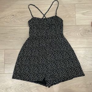 NWOT. Floral romper. Black and white. Size small.